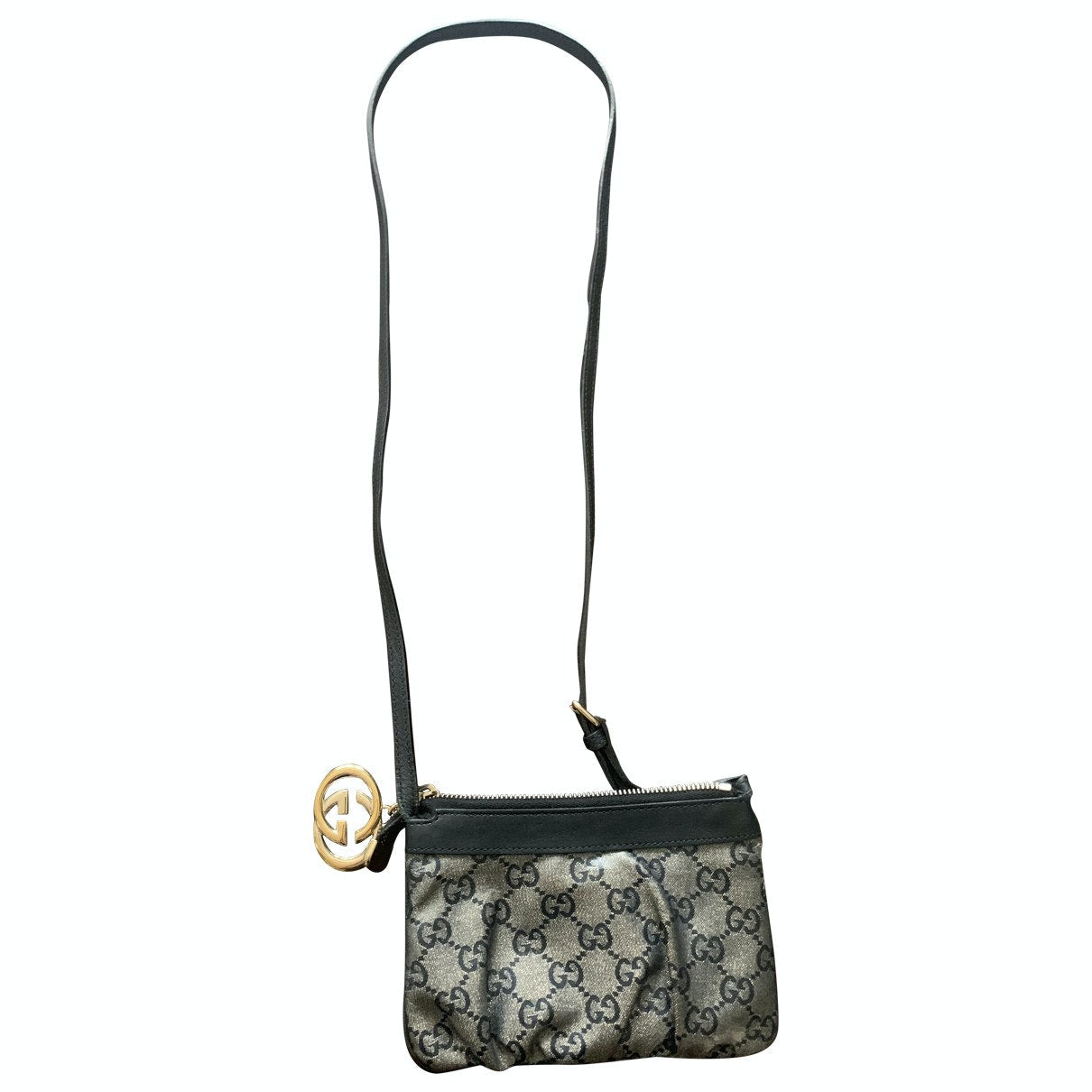 Gucci metallic leather clutch bag