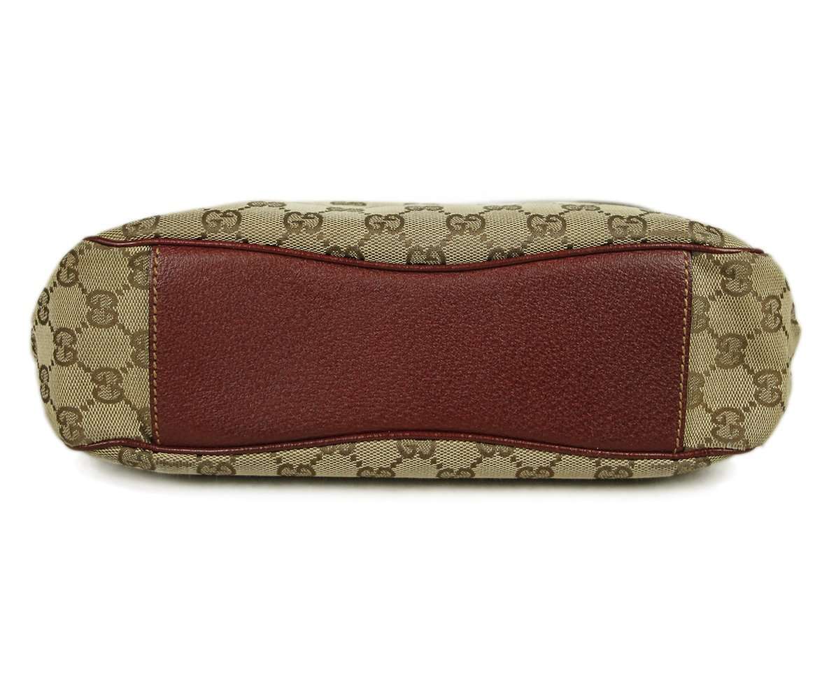 GUCCI MONOGRAM LEATHER AND CANVAS HANDBAG