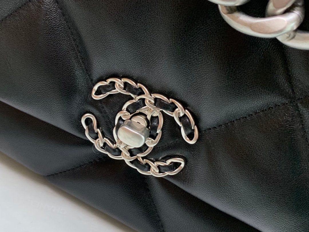 Chanel Maxi Black Travel Bag