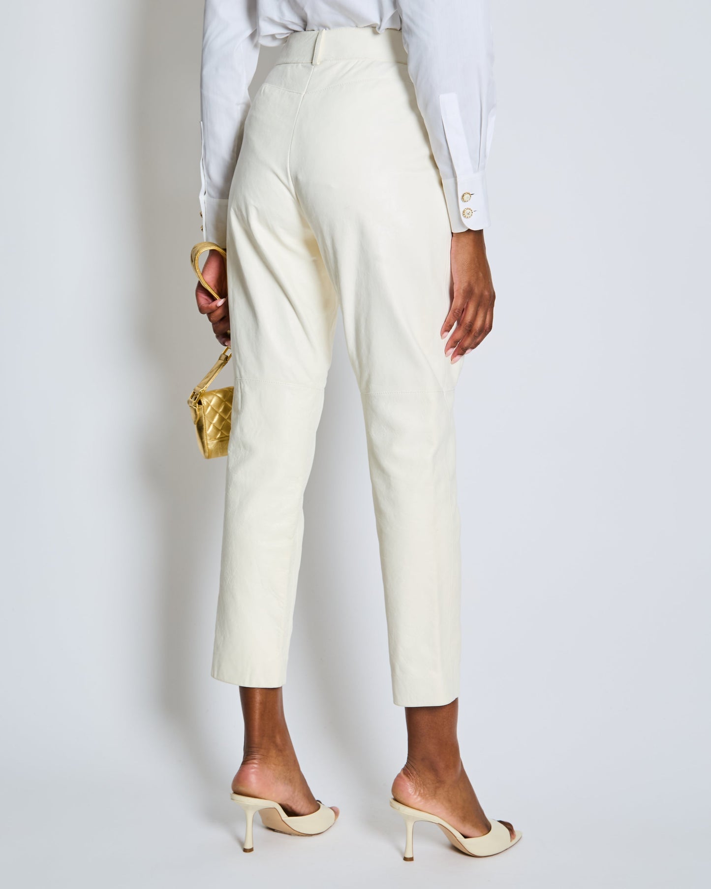Chanel Resort 2019 La Pausa White Leather Tro rs with Gold and Pearl Embellished CC Logo Button Size FR 36 (UK 8)