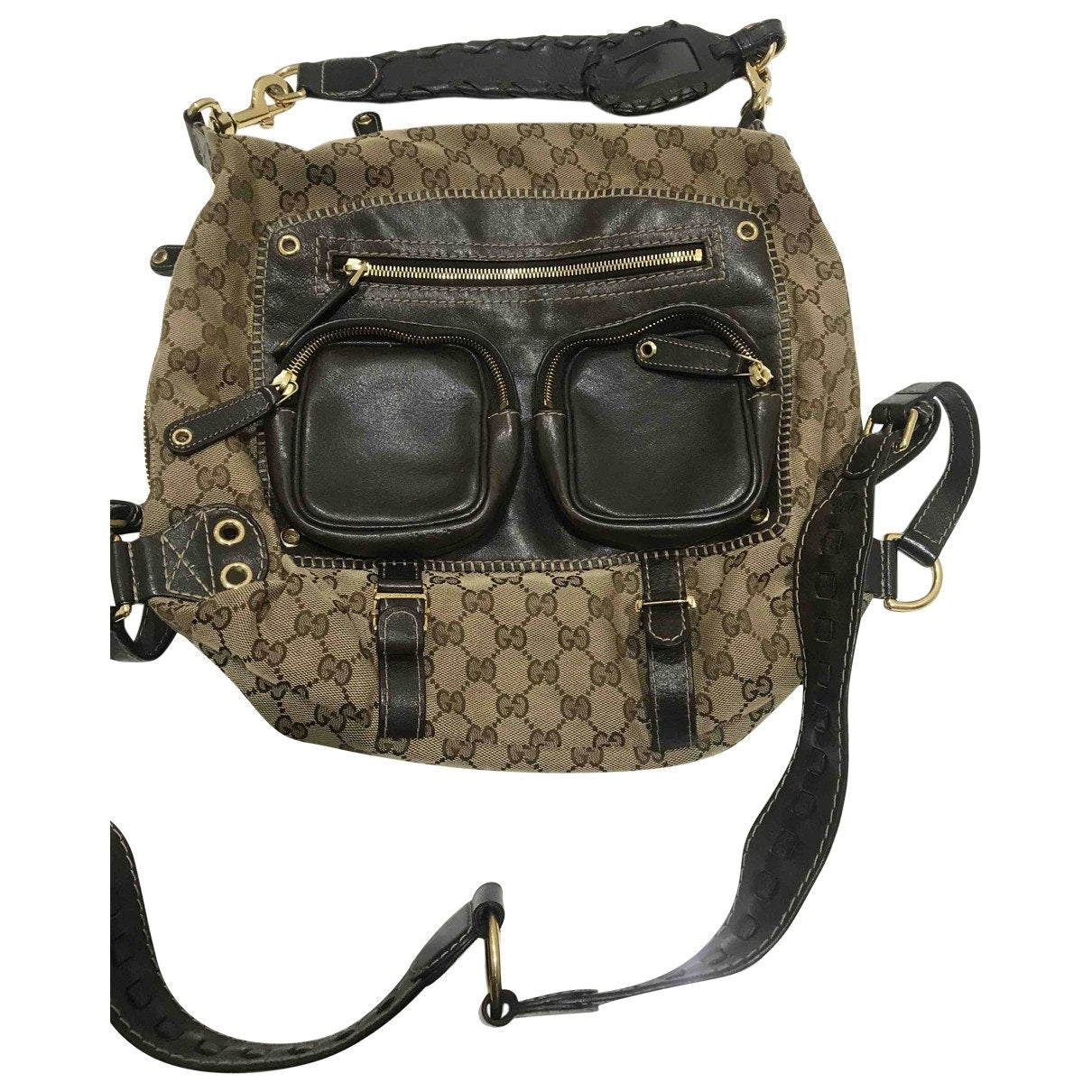 Gucci brown cloth backpacks