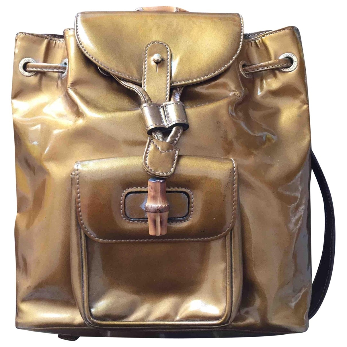 Gucci bamboo gold patent leather backpacks