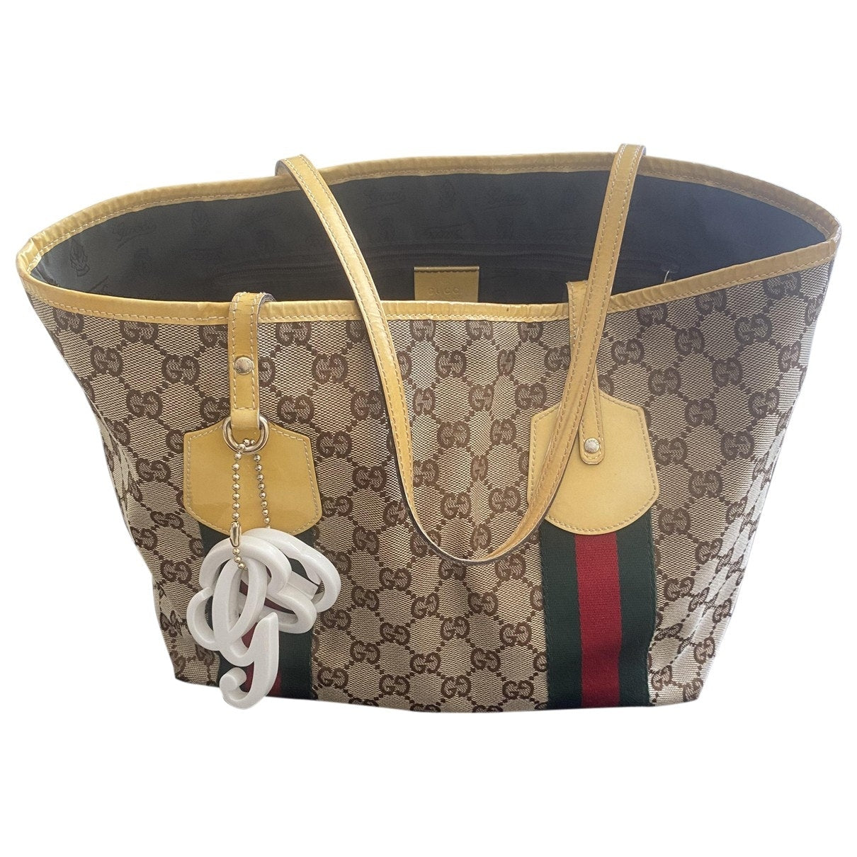 Gucci yellow cloth handbag