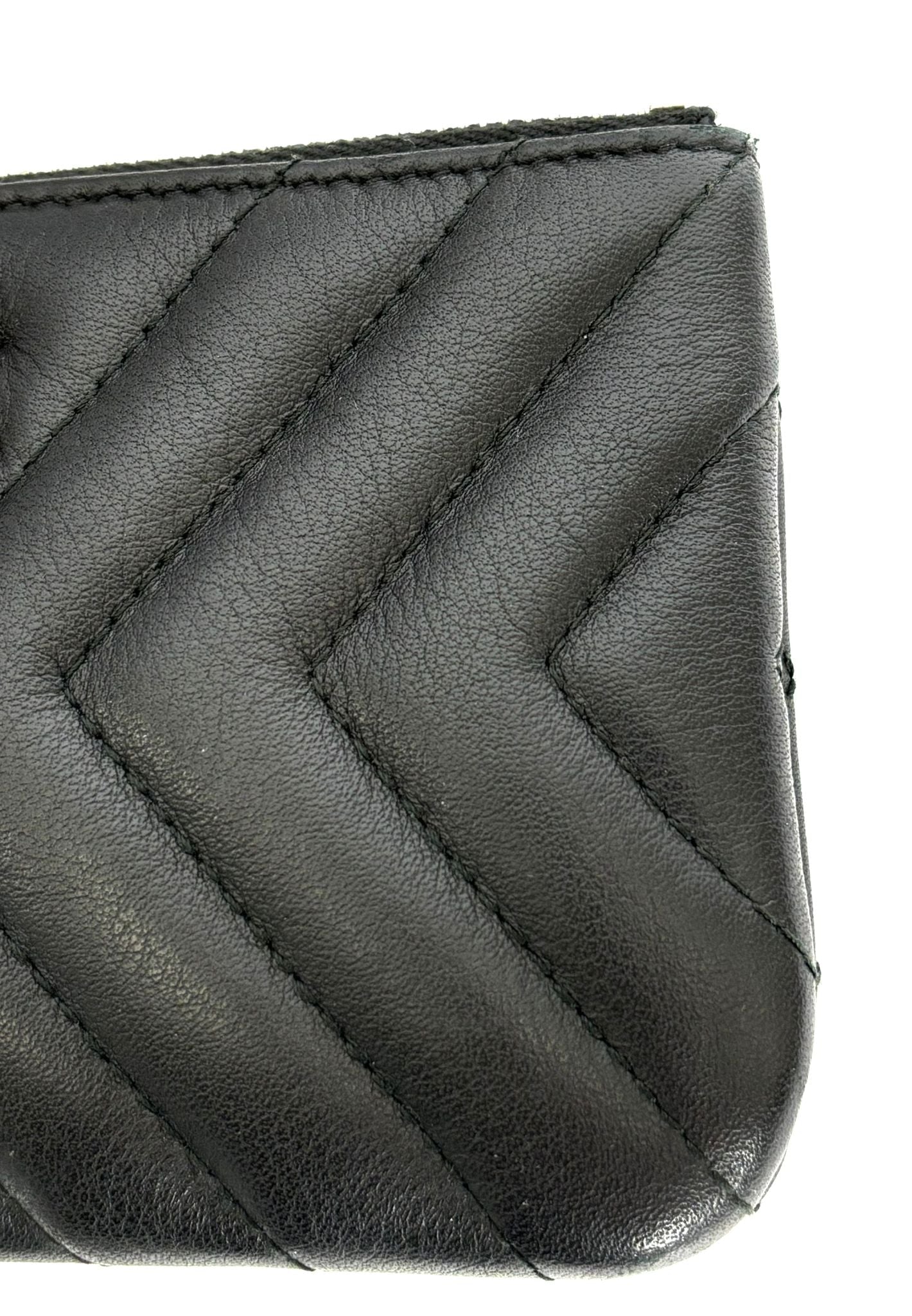 Chanel Leather Chevron Mini Tassel Zip Pouch Bag