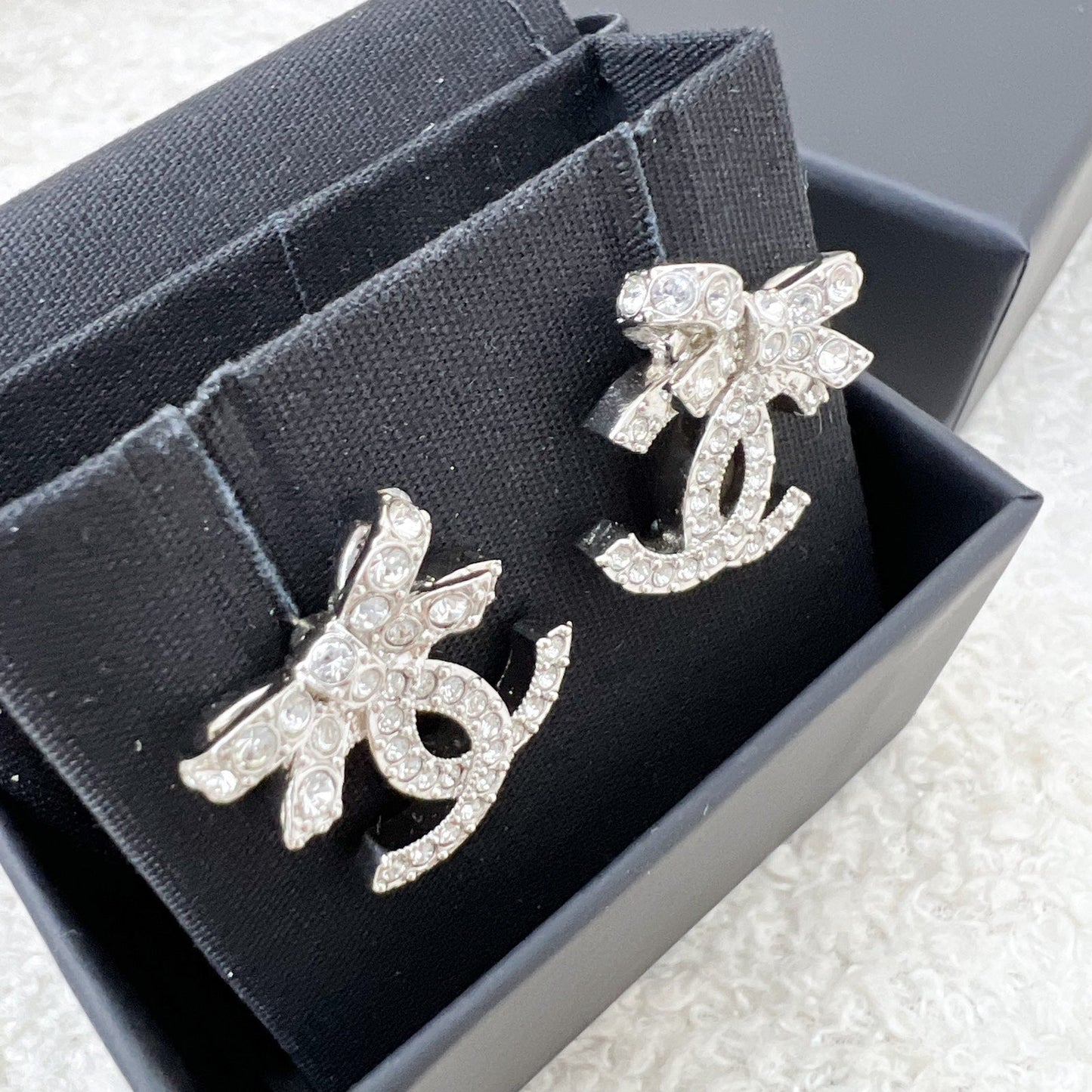 Chanel 23S Ribbon Earrings with Crystals in Shw