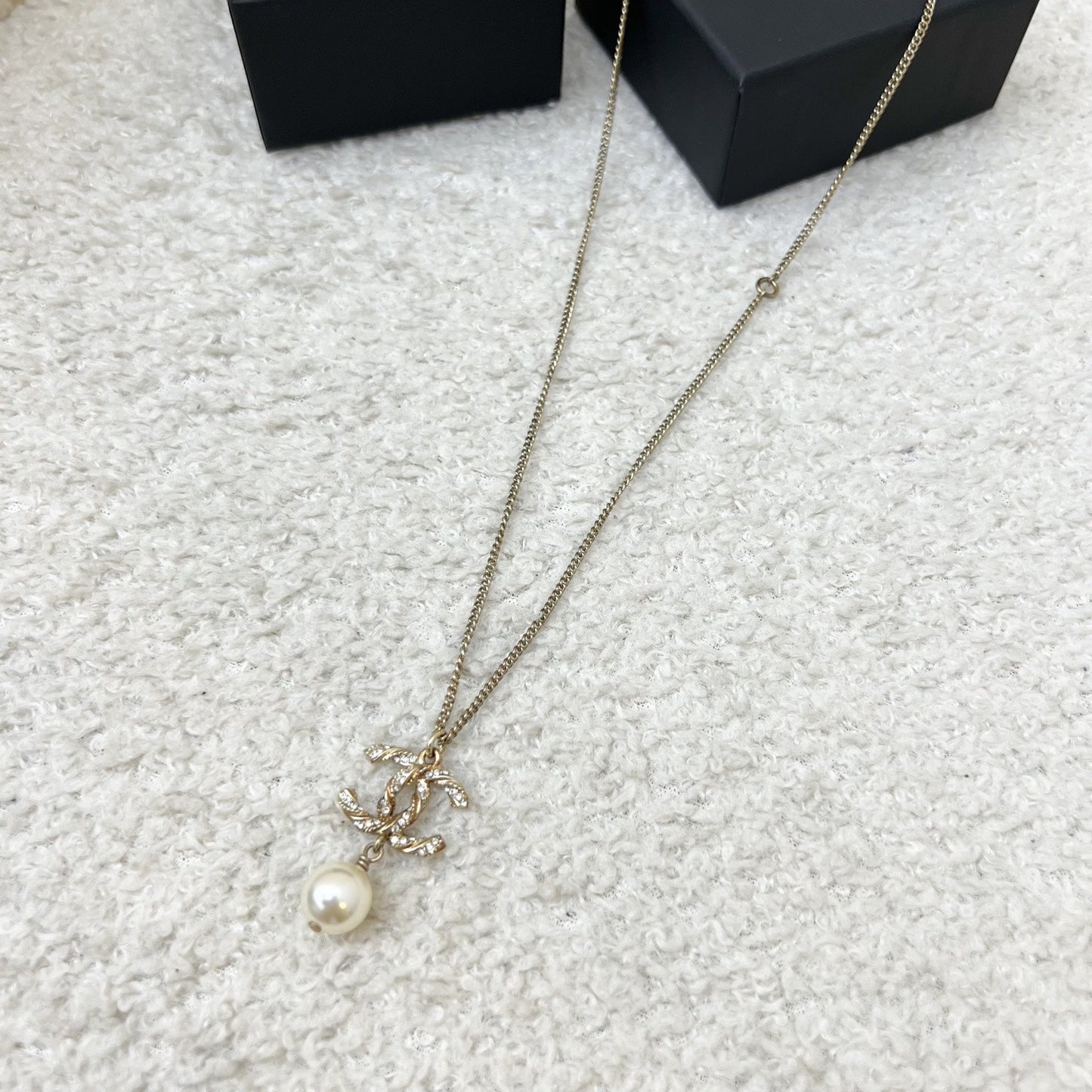 Chanel CC Logo with Dangling Pearl Necklace in Aged Gold Hw