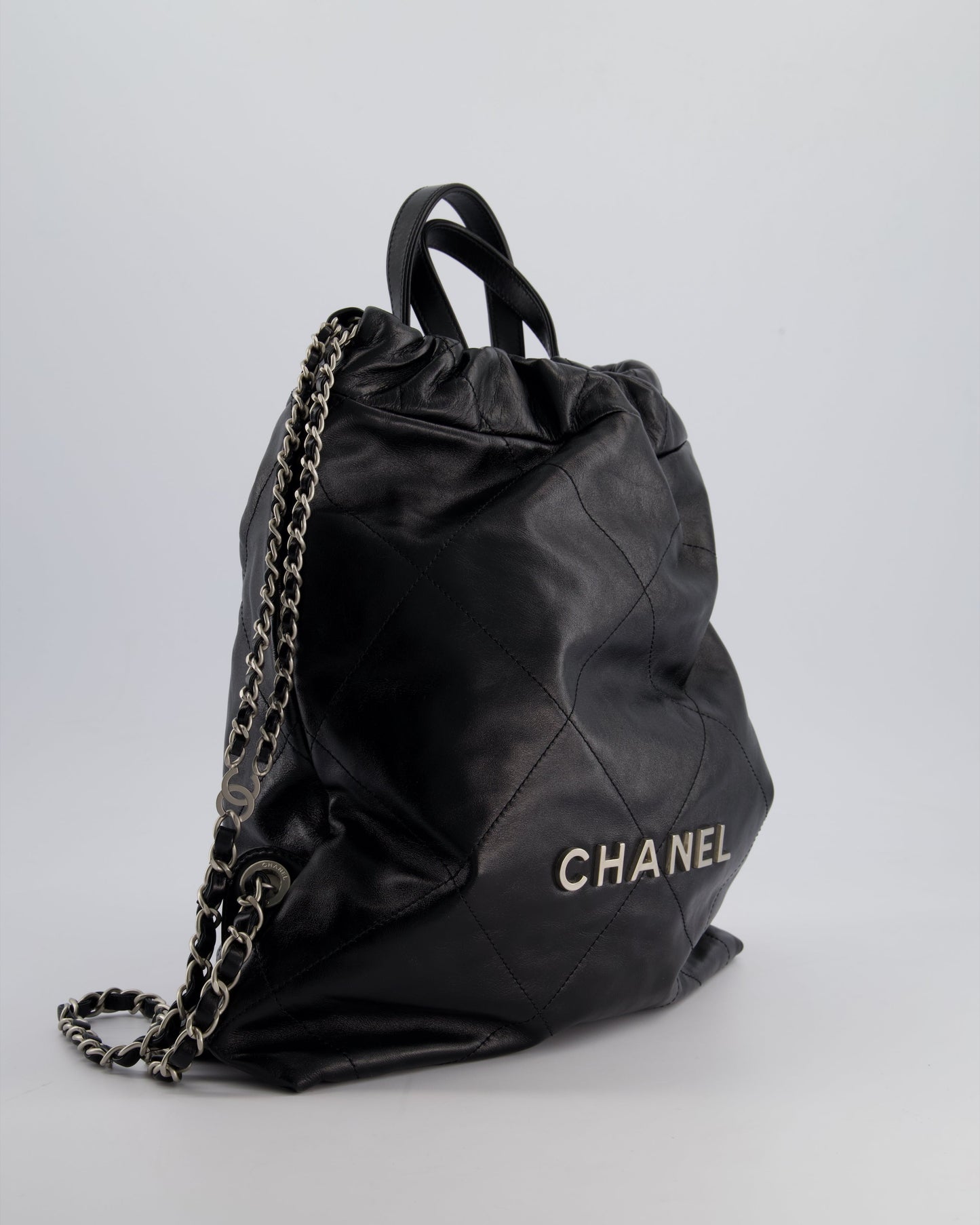 Chanel *Fire Price* 22 Small Backpack Bag In Black Shiny Calfskin With Brushed Silver Hardware