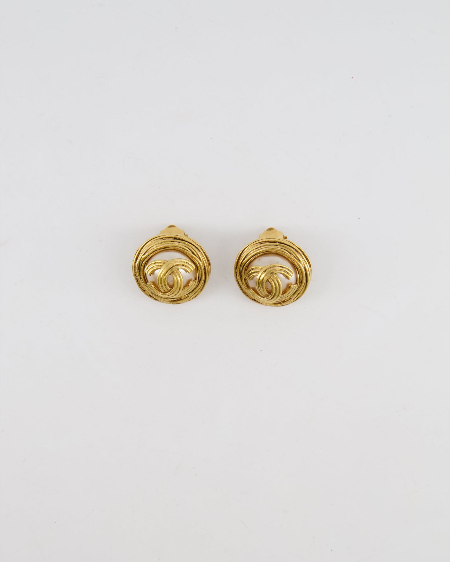 Chanel 94A Gold Spiral Round Clip On Earrings with Embedded Pearl and Gold CC Logo