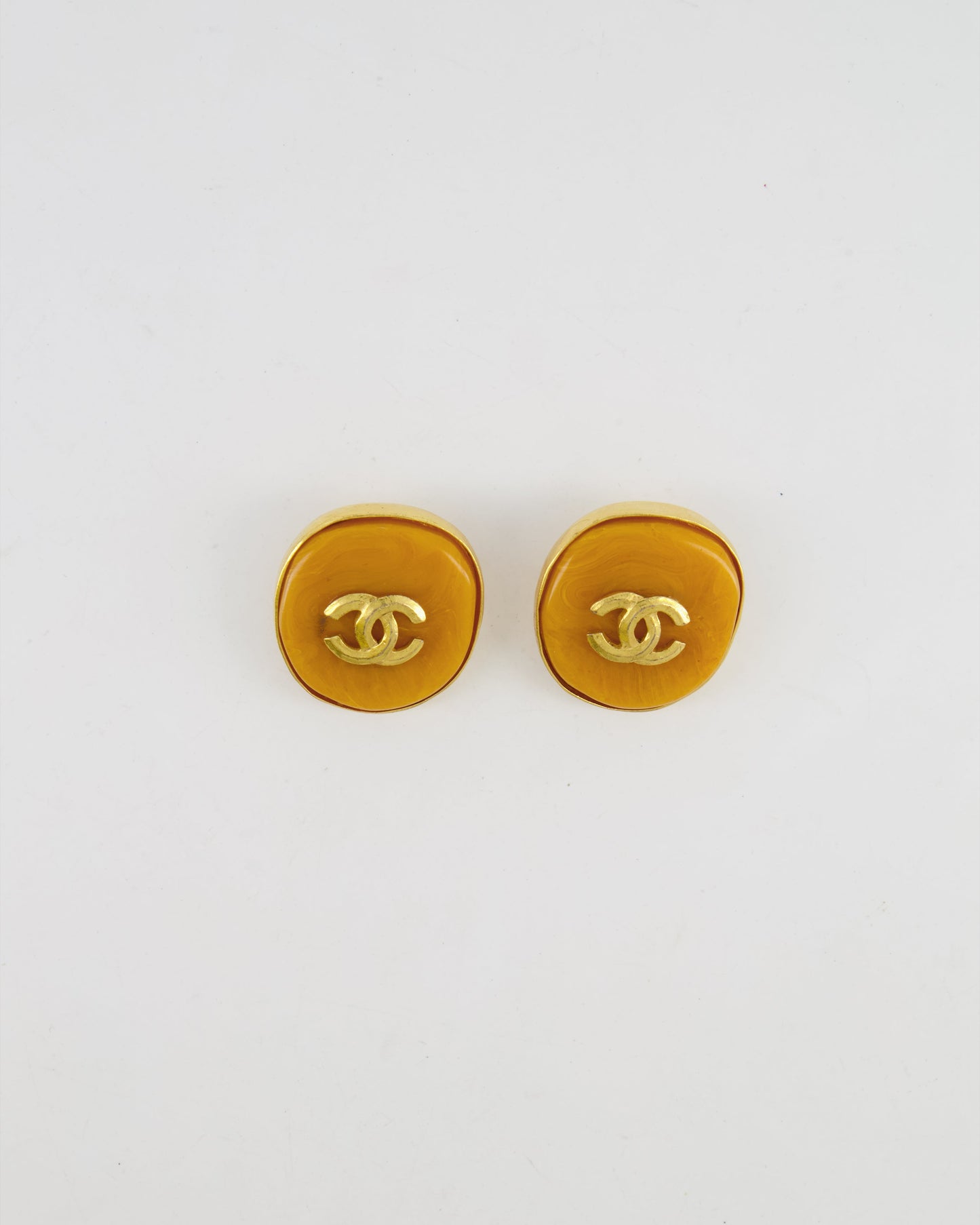 Chanel 98P Orange Rounded Clip On Earrings with Gold Rim and CC Logo Detail