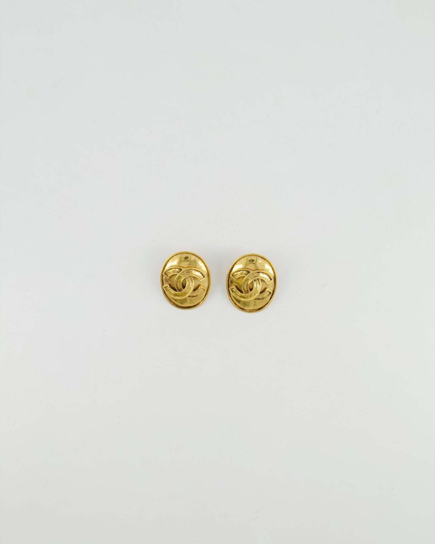 Chanel 94P Gold Polished Oval Clip On Earrings with CC Logo