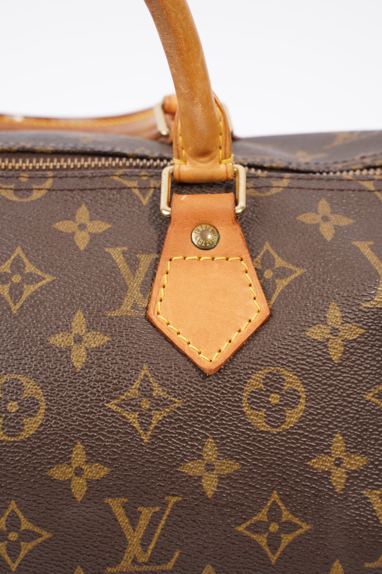 Louis Vuitton Speedy Coated 35 Monogram Brown Canvas Coated Canvas Apparel