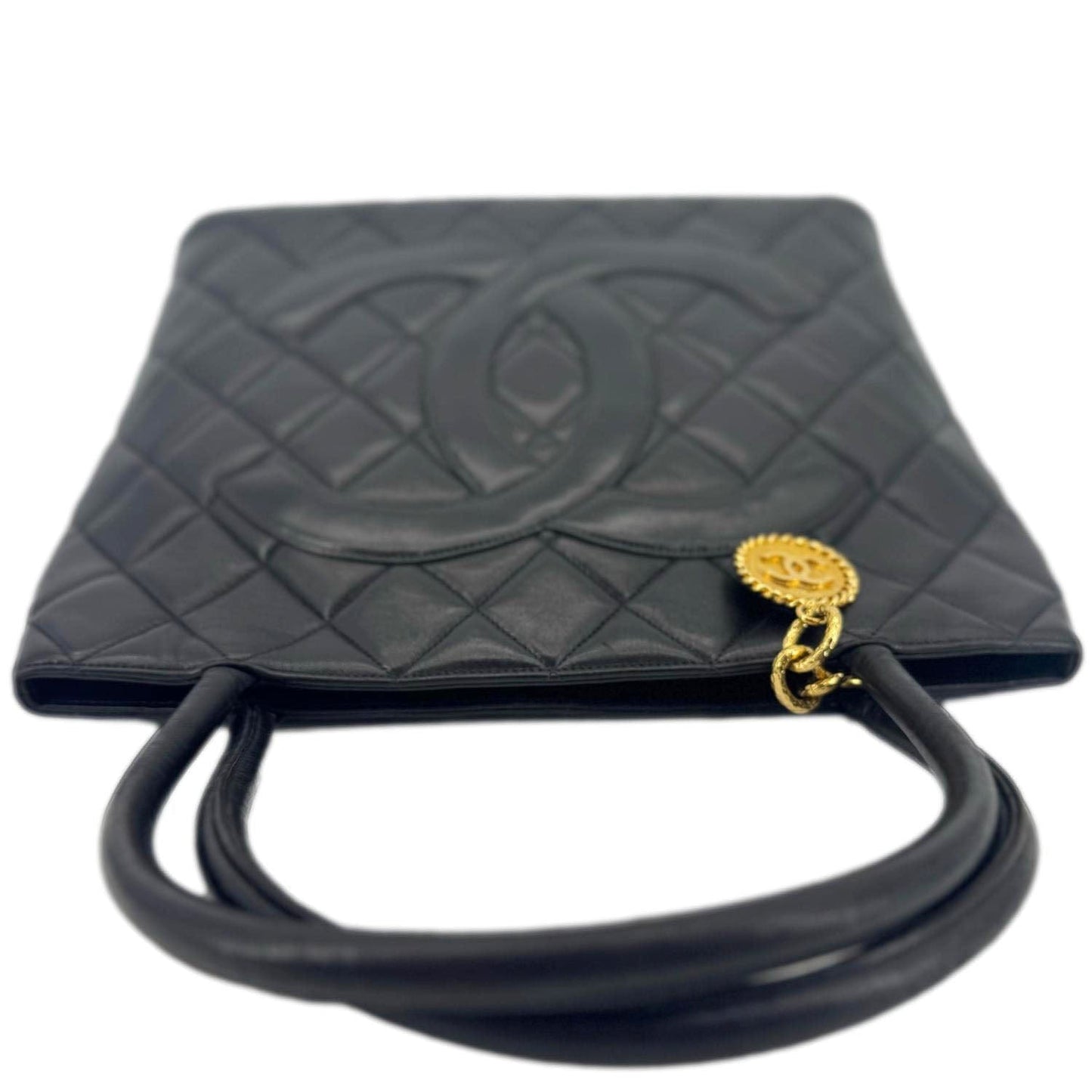 Chanel Medallion Quilted Leather Black Travel Bag