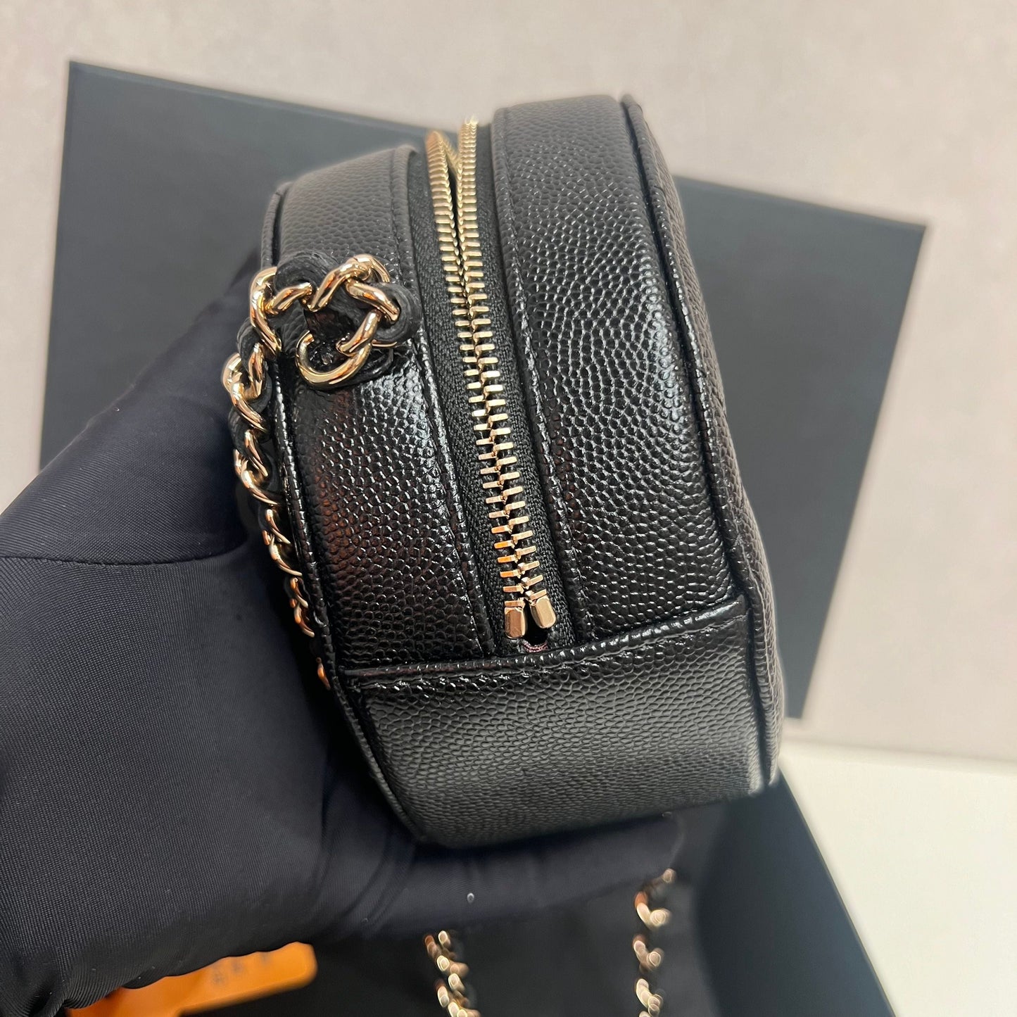 CHANEL Iridescent Caviar Quilted Round Clutch With Chain Black