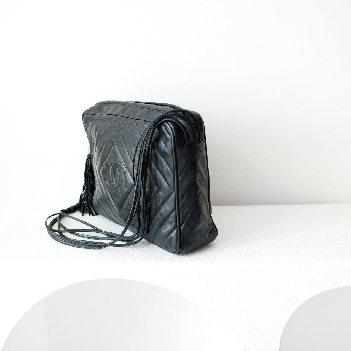 Chanel black quilted lambskin crossbody bag with tassel