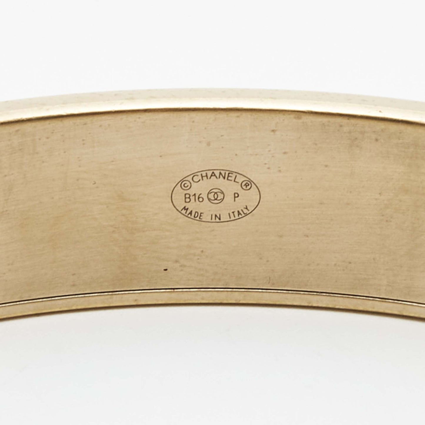 Chanel CC Composite Gold Tone Bangle Bracelet