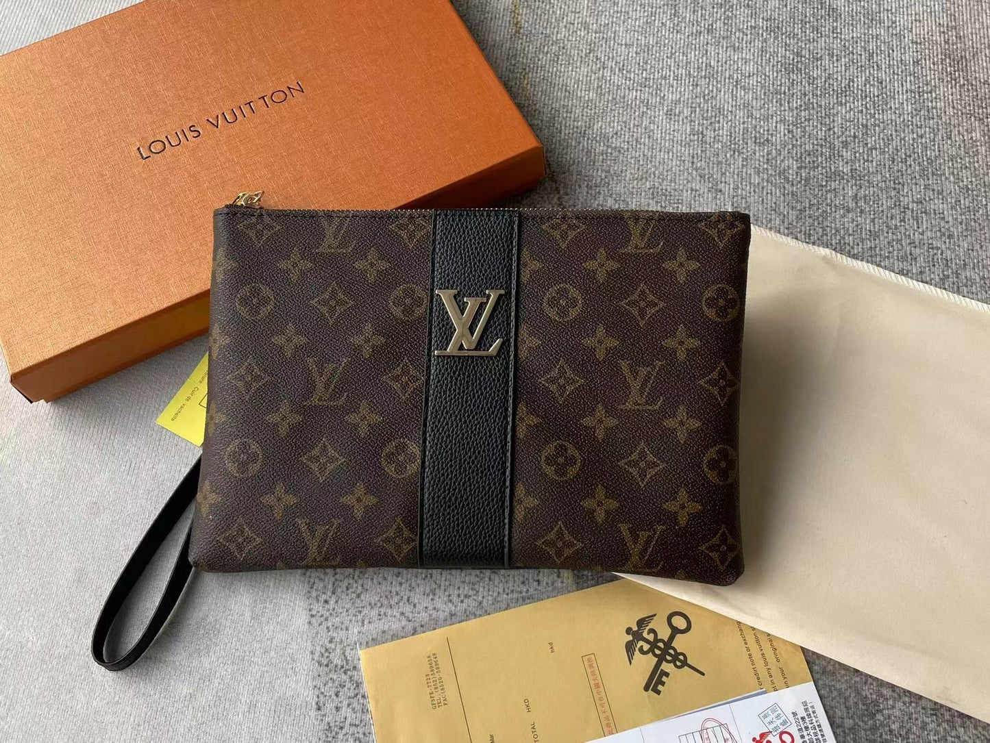 Louis vuitton handbag (wristlet bag)