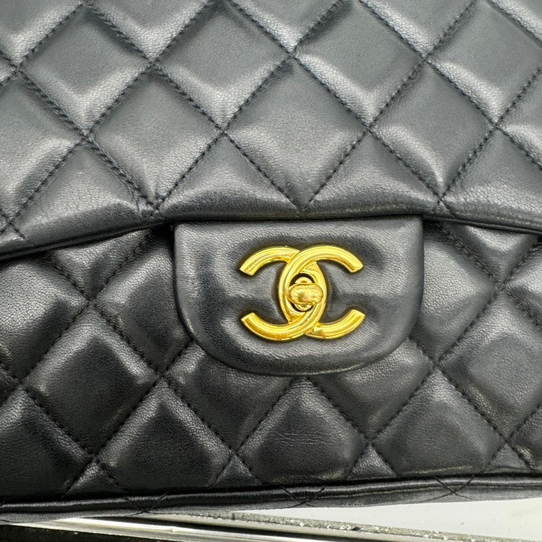 Chanel Maxi Flap Bag Black Lambskin Quilted Large