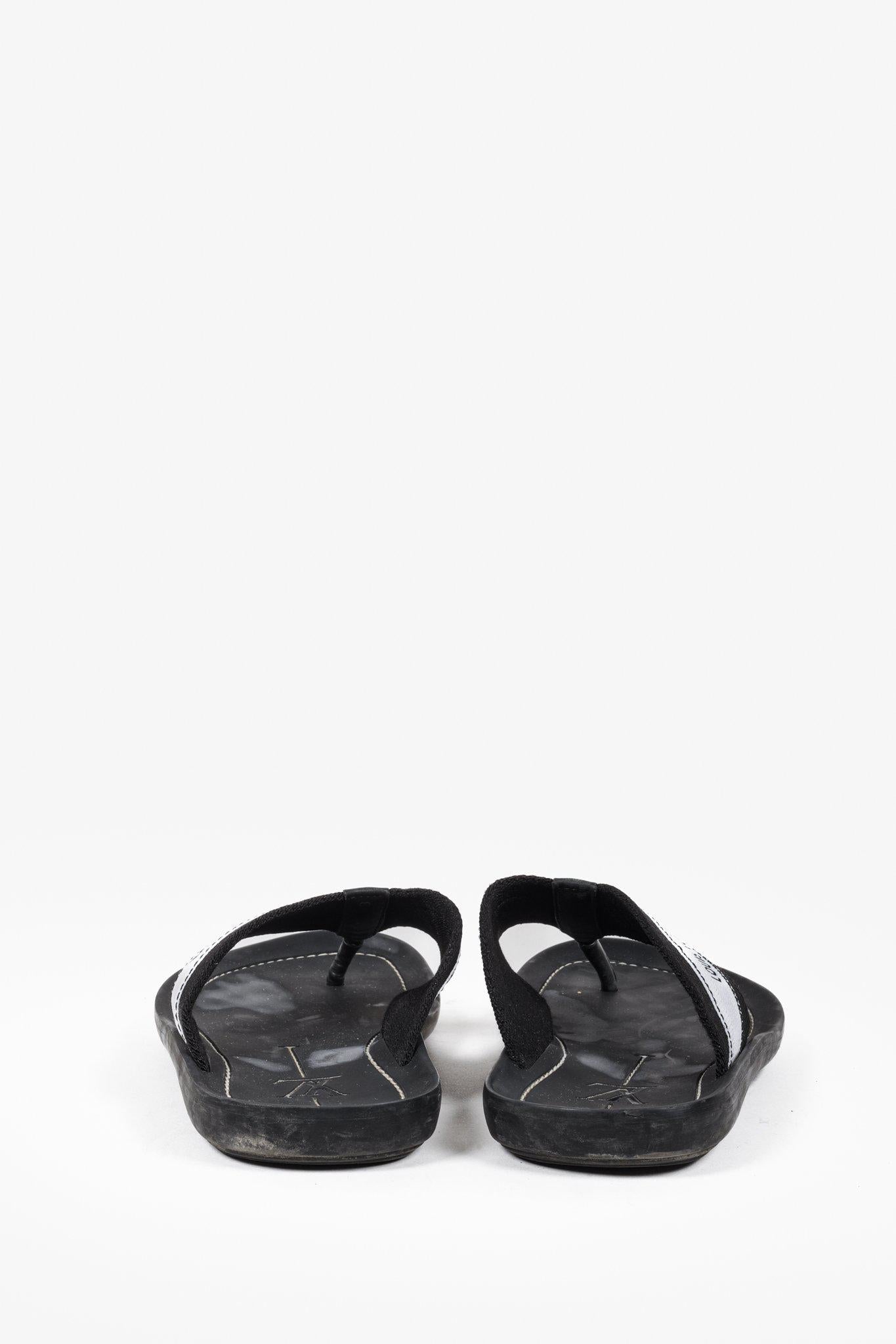 Louis Vuitton Black and White Canvas Flip Flops Fashion Accessory