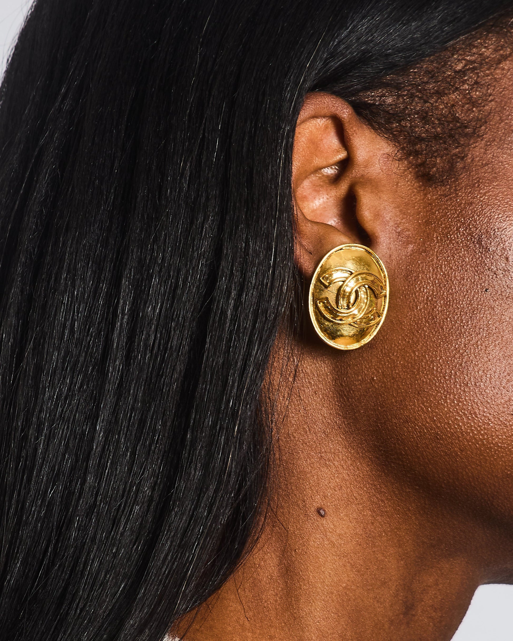 Chanel 94P Gold Polished Oval Clip on Earrings with CC Logo