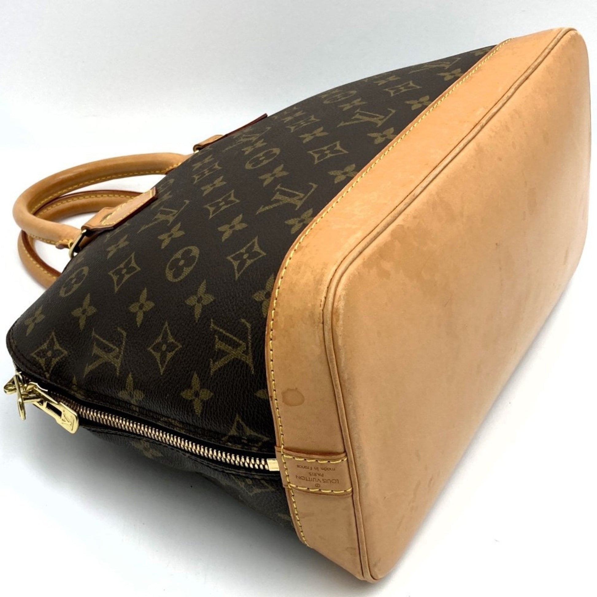 LOUIS VUITTON Alma Handbag