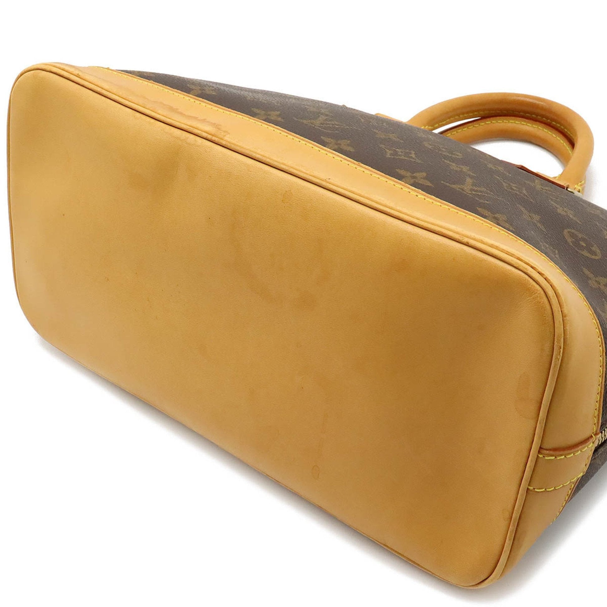 LOUIS VUITTON Alma Handbag