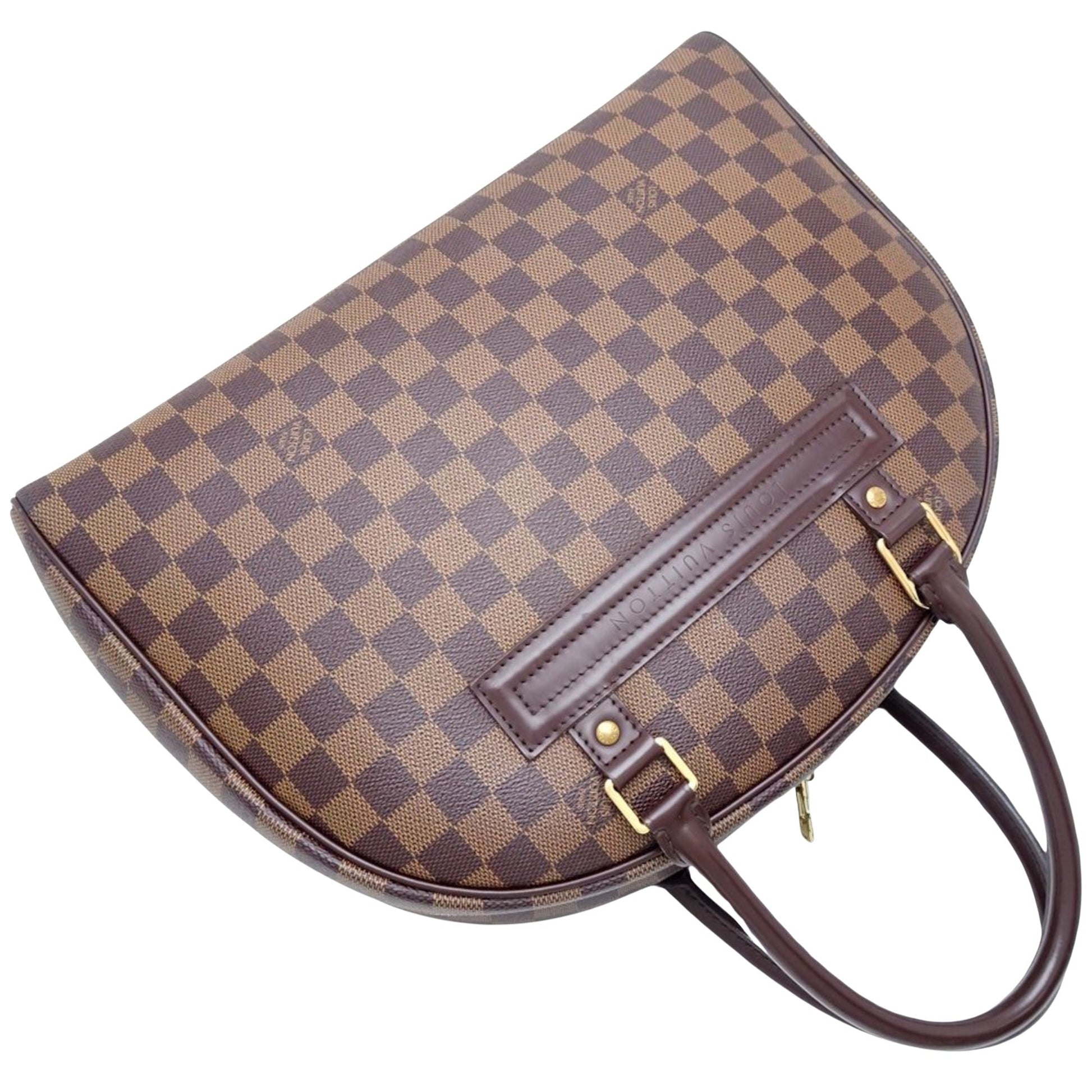 LOUIS VUITTON Nolita Handbag