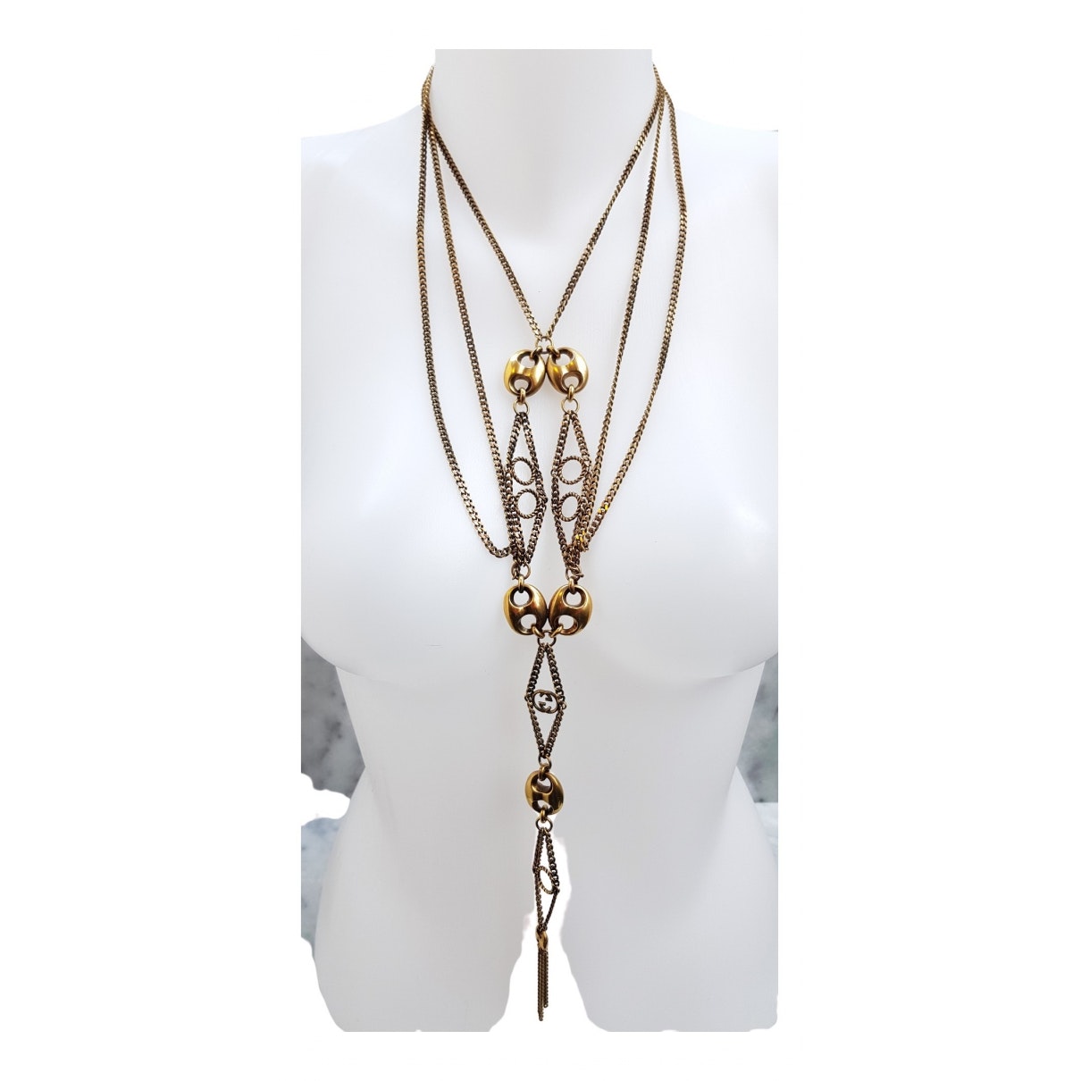 Gucci gold metal necklaces