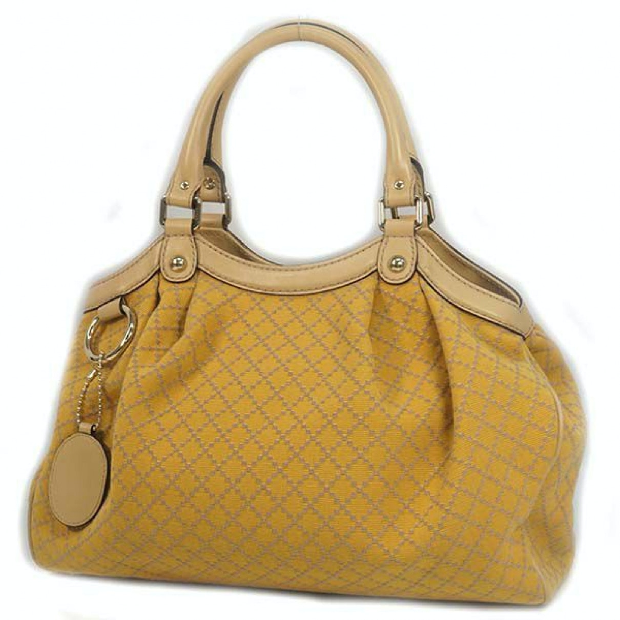 Gucci yellow cloth handbag