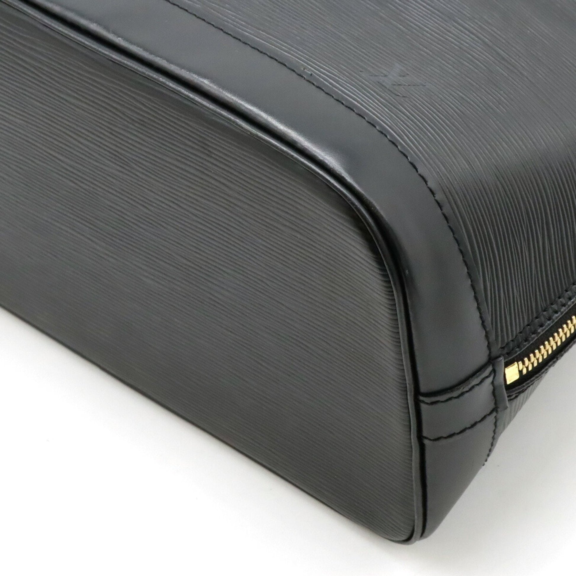 LOUIS VUITTON Alma Handbag