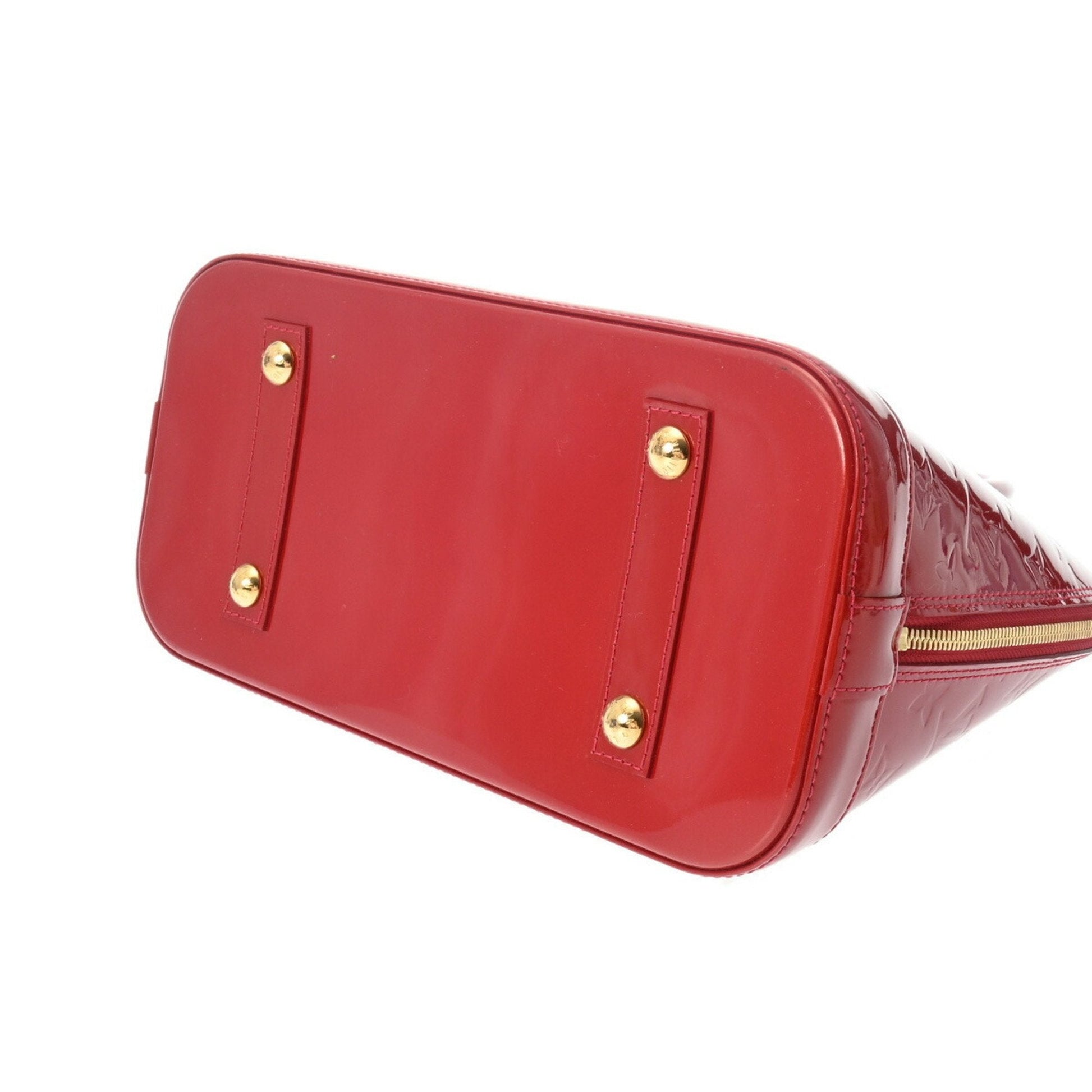 LOUIS VUITTON Alma Handbag