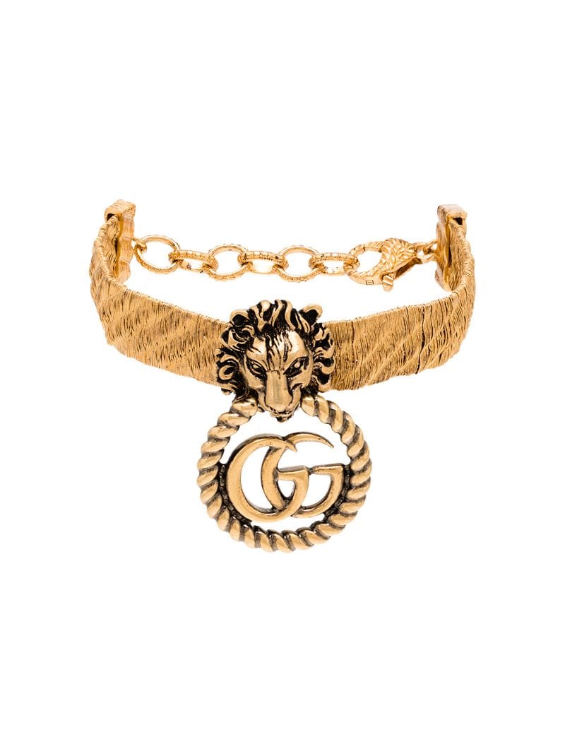 Gucci - lion head GG hoop bracelet - women - metal - One Size - GOLD