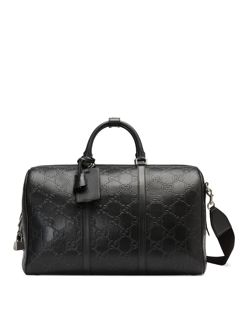 Gucci - logo-embossed holdall - men - Cotton/Linen/Flax/Leather - One Size - Black