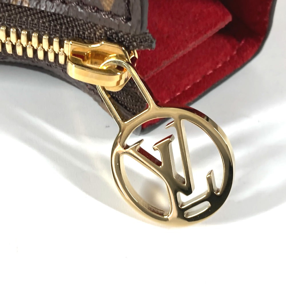 Louis Vuitton Sporting goods tanned wood rubber Monogram Leather Canvas Handbag