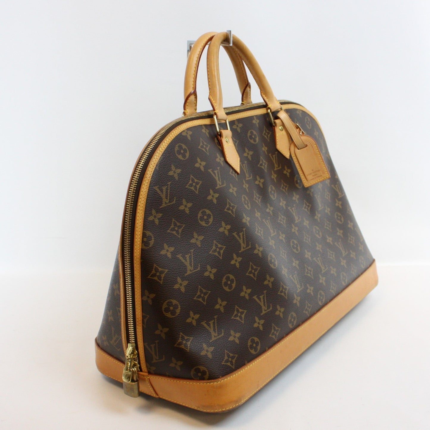 Louis Vuitton ALMA VOYAGE Monogram Handbag