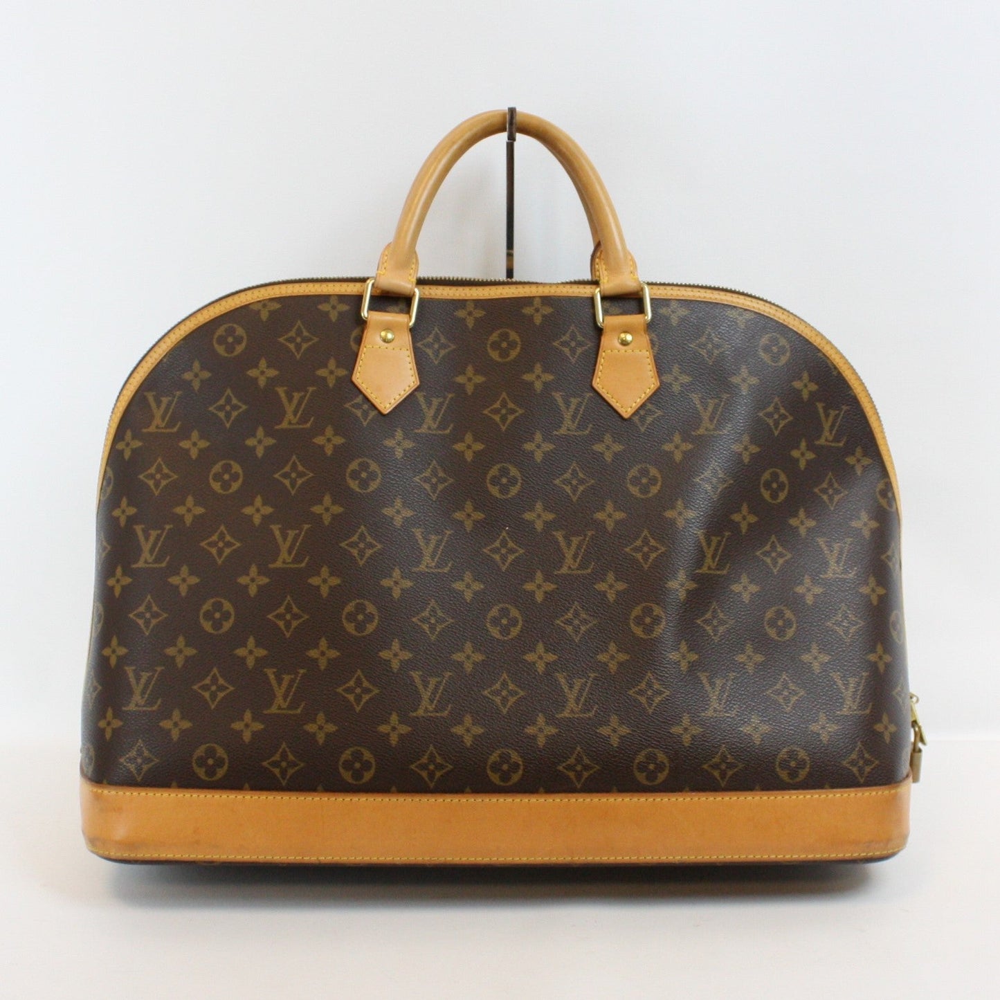 Louis Vuitton ALMA VOYAGE Monogram Handbag