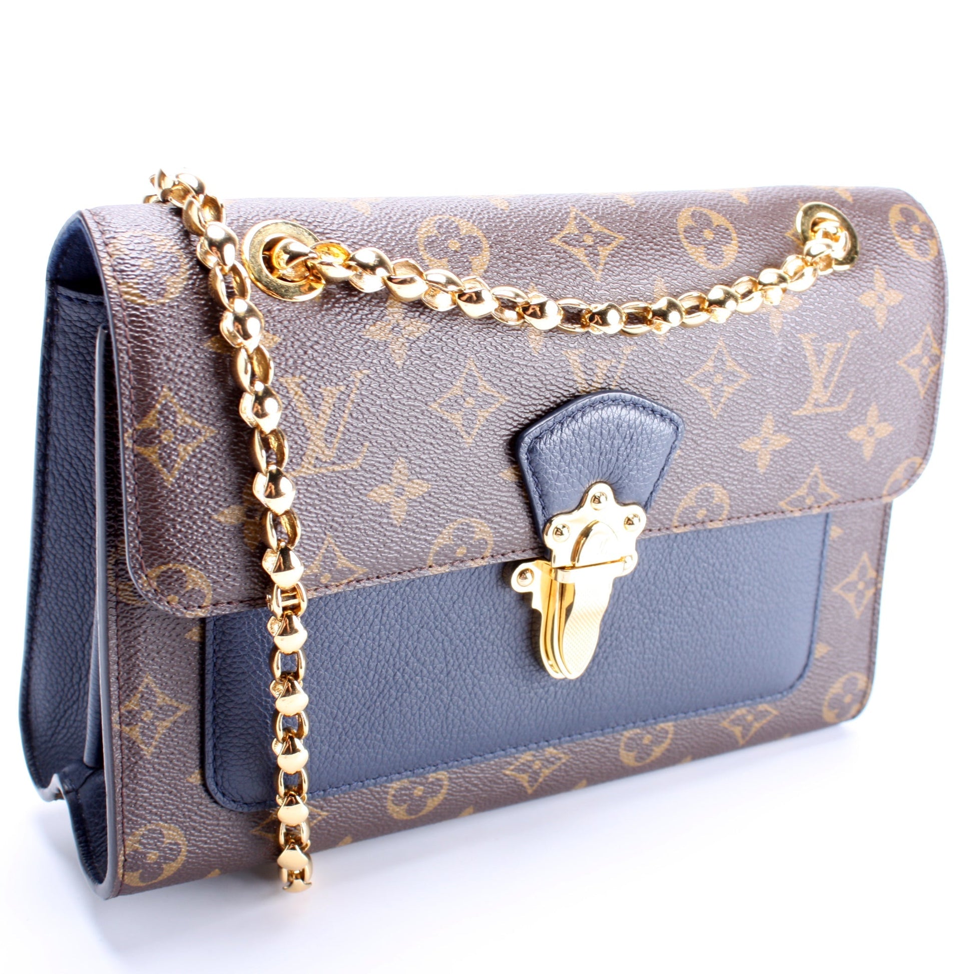 Louis Vuitton Victoire Monogram Handbag