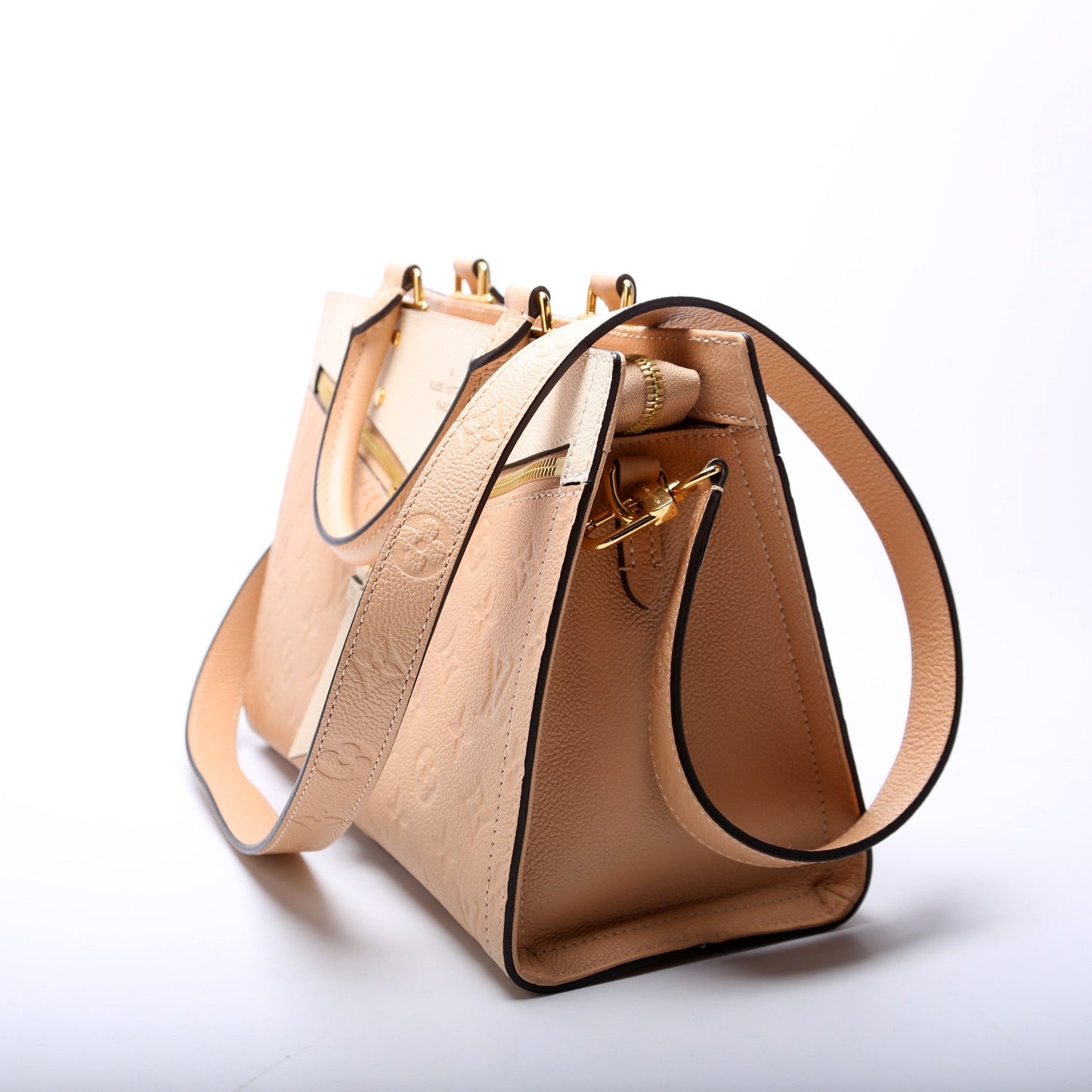 Louis Vuitton Sully Peach Cream PM Empreinte Handbag
