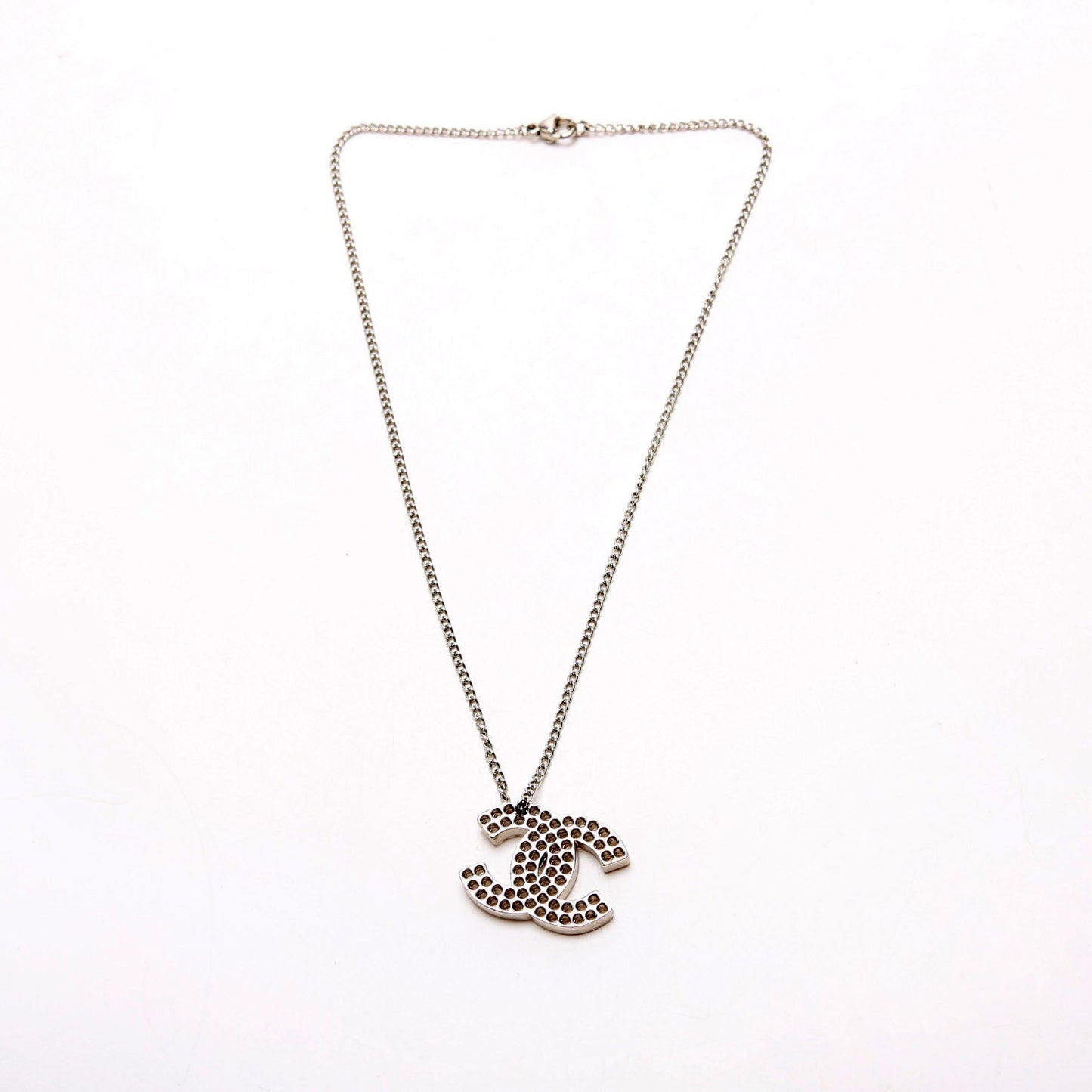 Chanel CC Cut Out Medium Pendent Necklace Silver