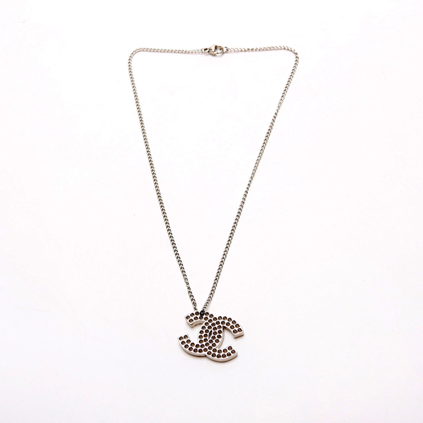 Chanel CC Cut Out Medium Pendent Necklace Silver