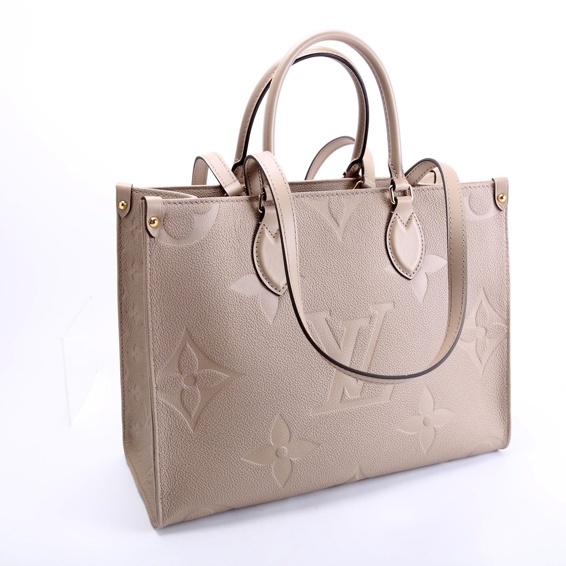 Louis Vuitton ONTHEGO MM Taupe Empreinte Leather Handbag