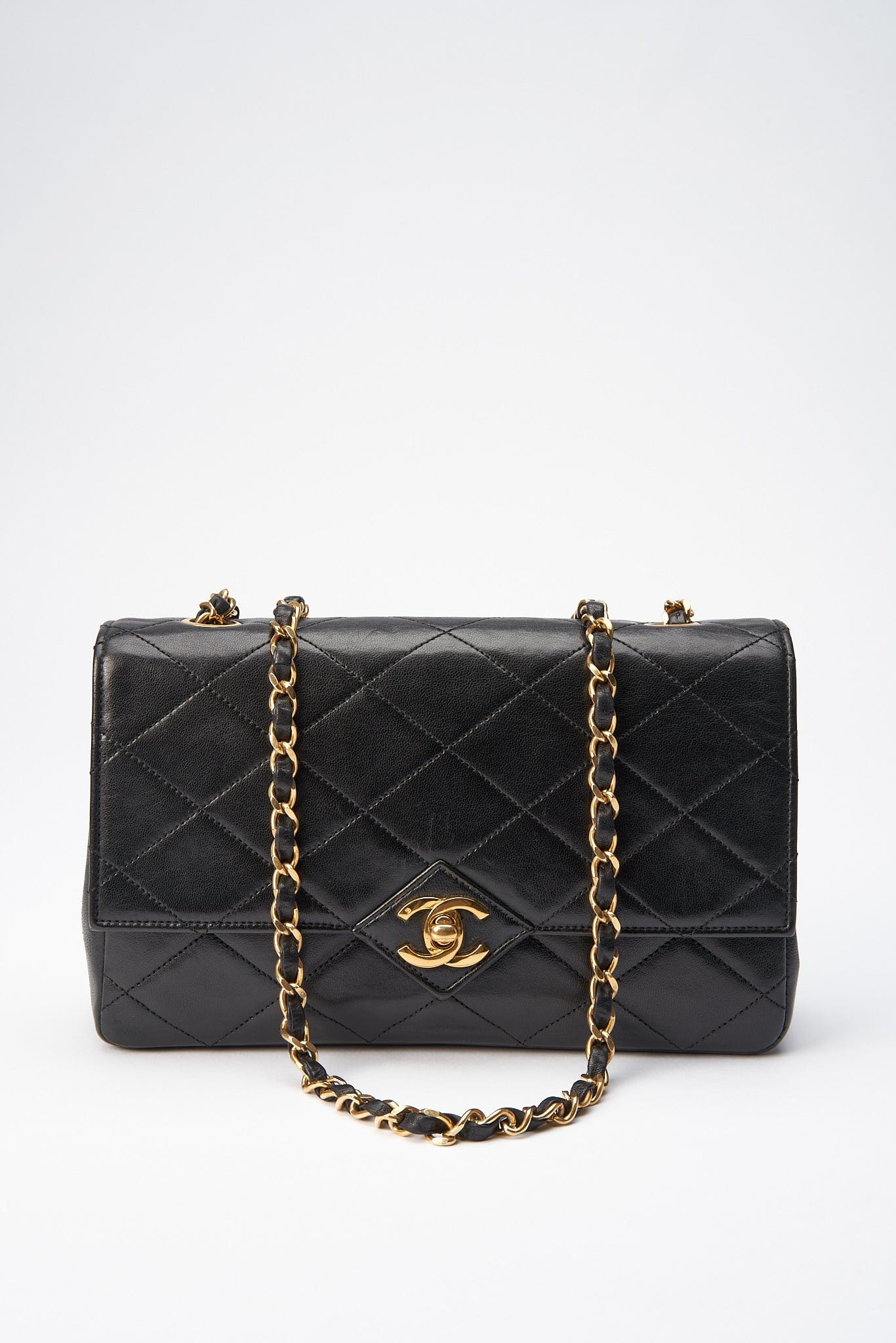 Chanel   Black Single Flap with 24k gold plated hardware and V design