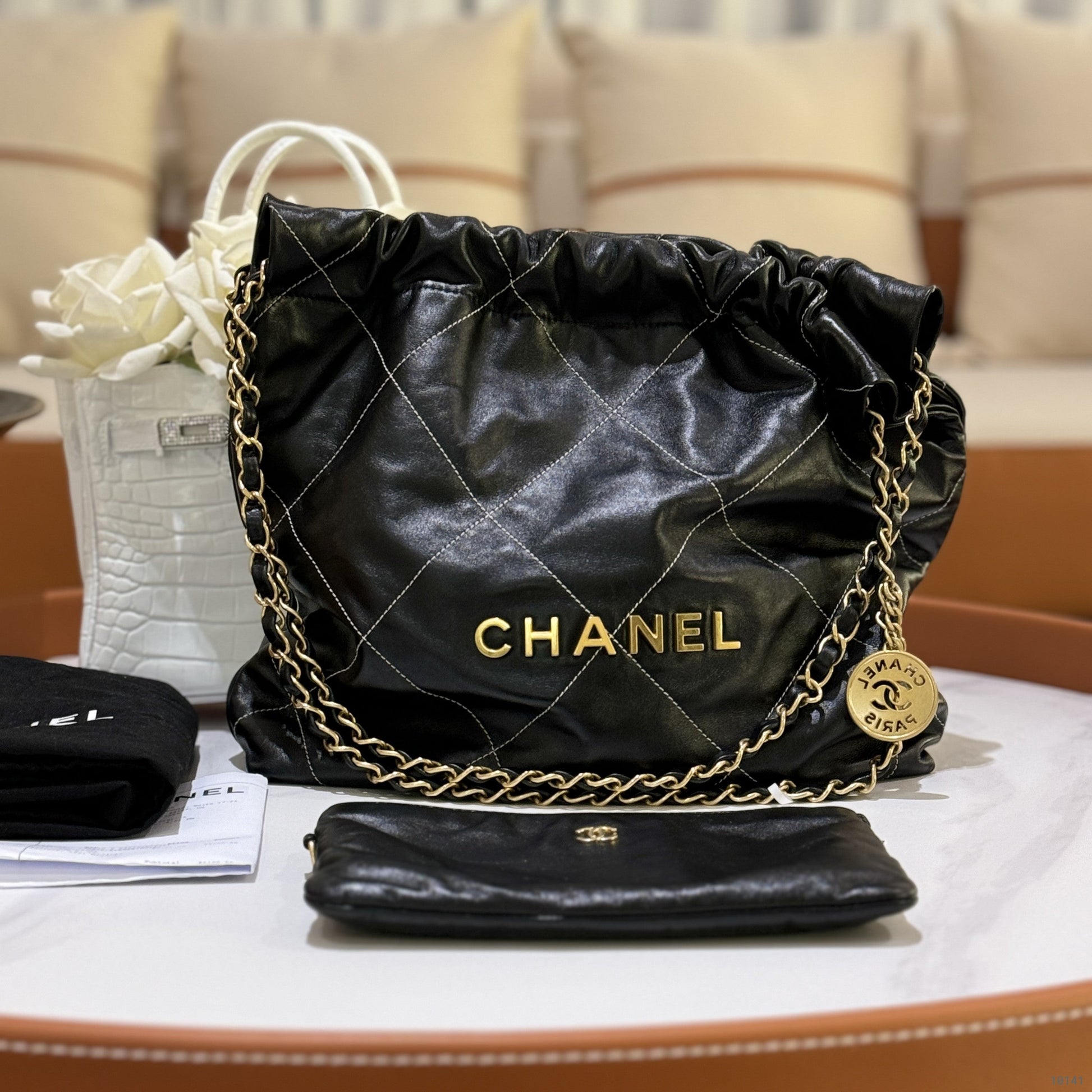 CHANEL 22 BAG SMALL IN BLACK WITH WHITE STITCHING