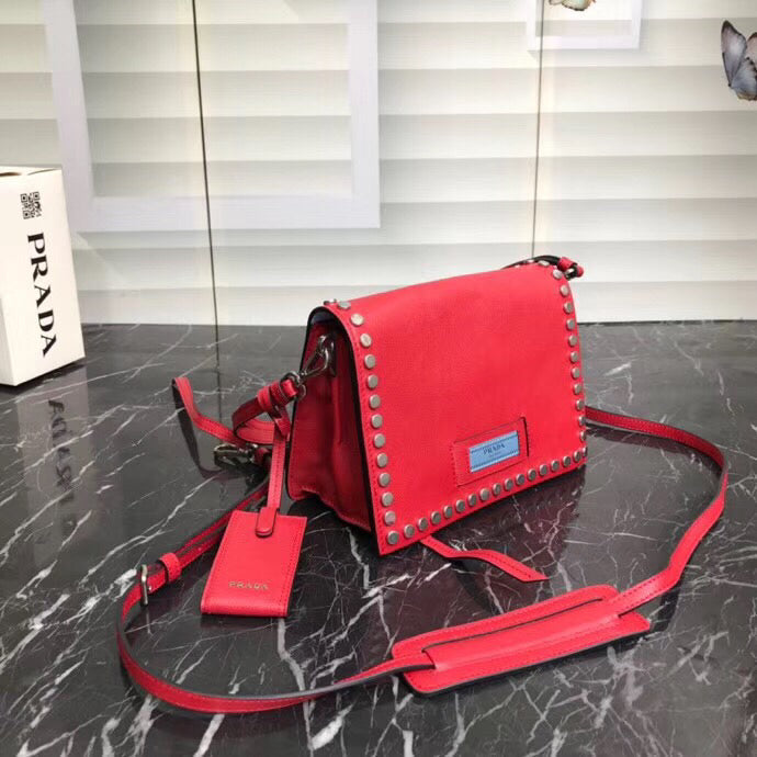 Prada Etiquette Bag In Calfskin With Stud Trim Metal Red Travel Bag