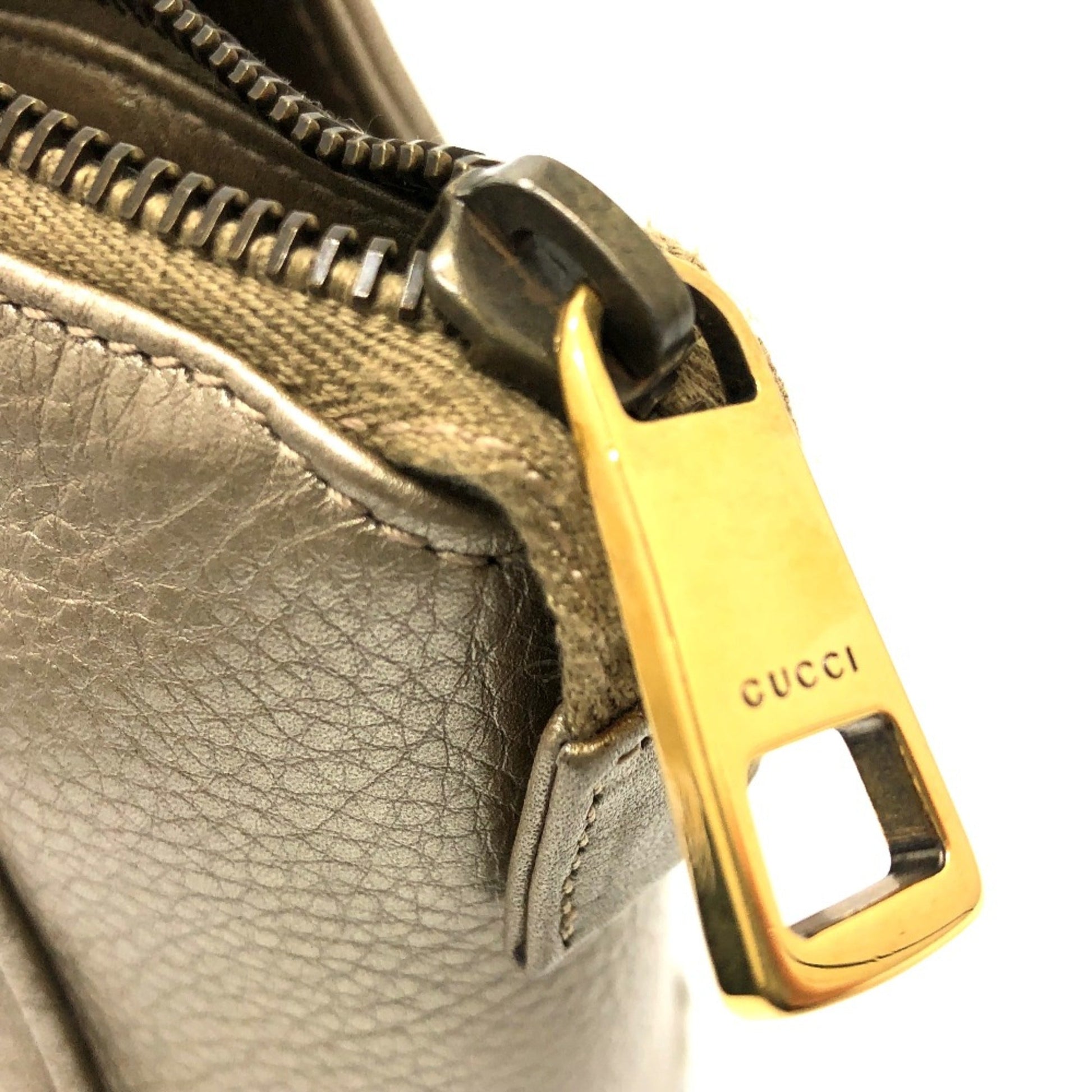 Gucci Gold Leather Handbag