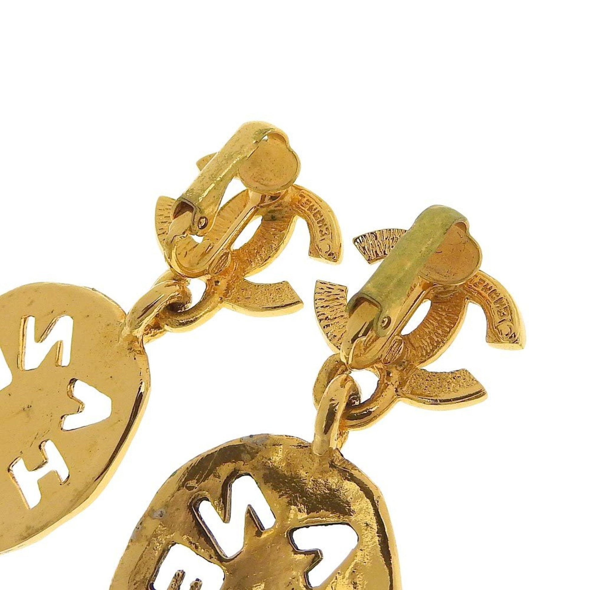 Chanel earrings here mark gold logo  