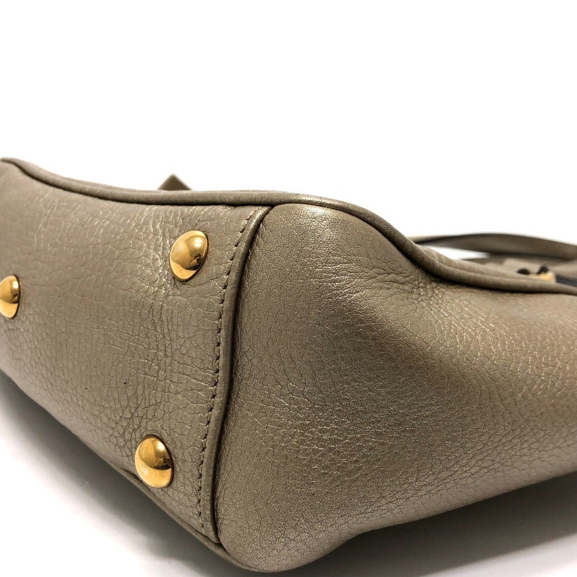 Gucci Gold Leather Handbag