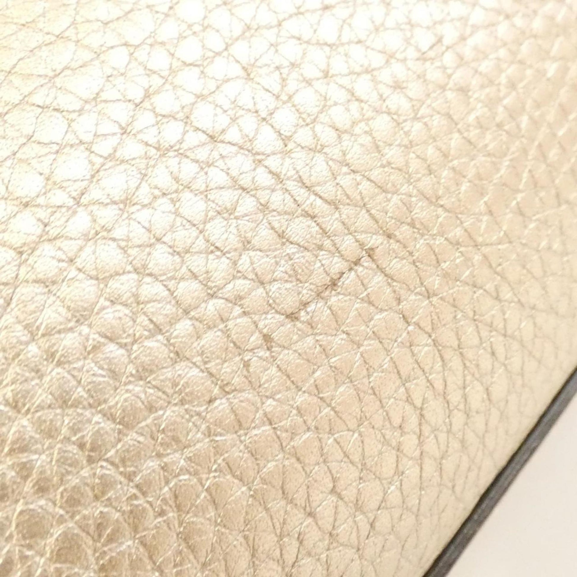 Gucci Champagne Leather Handbag