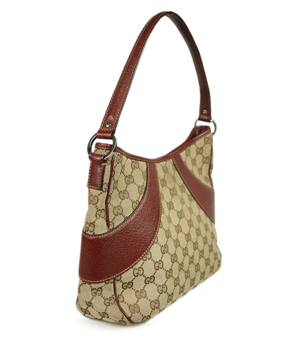 GUCCI MONOGRAM LEATHER AND CANVAS HANDBAG