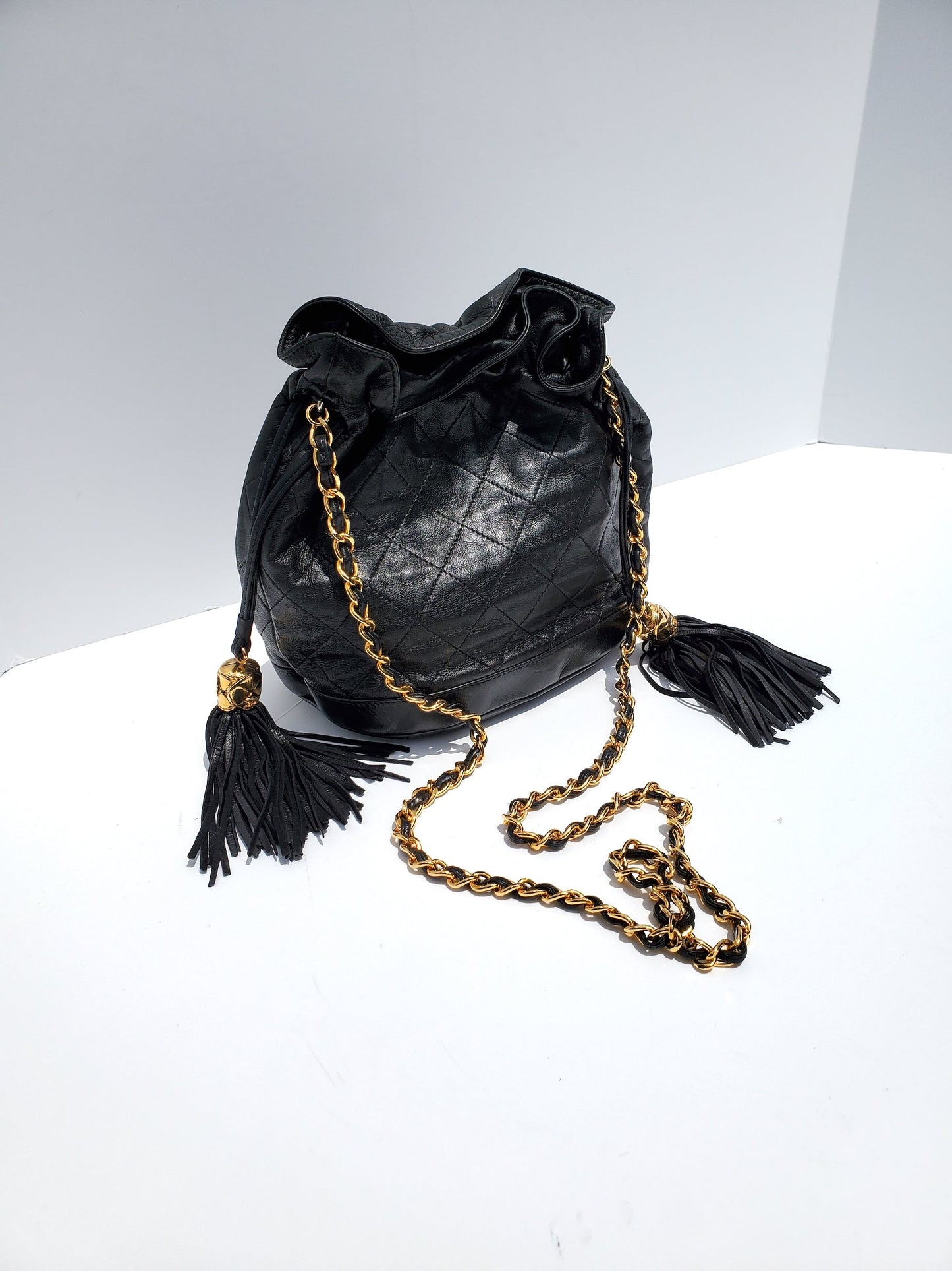 Chanel 24K Gold Black Leather Quilted Bucket Bag