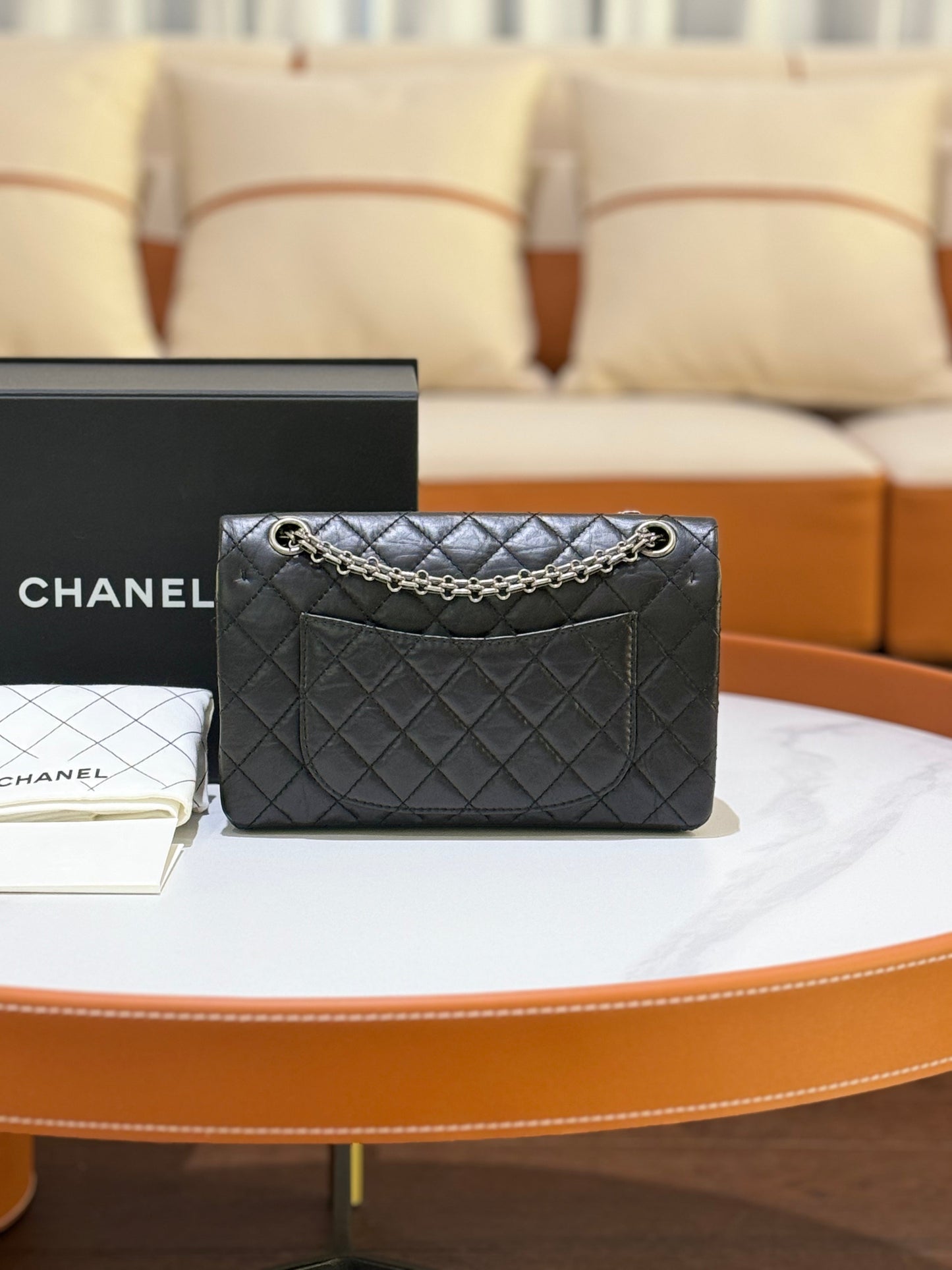 CHANEL 2.55 BLACK WITH SILVER HARDWARE AND CHIP